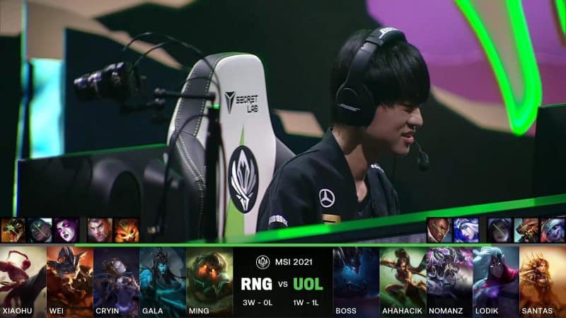 A screenshot from the LoL Esports broadcast for the Mid-Season Invitational (MSI) match between Royal Never Give Up (RNG) and Unicorns of Love. The picked and banned champion drafts appear at the bottom of the image with a shot of RNG Ming above.
