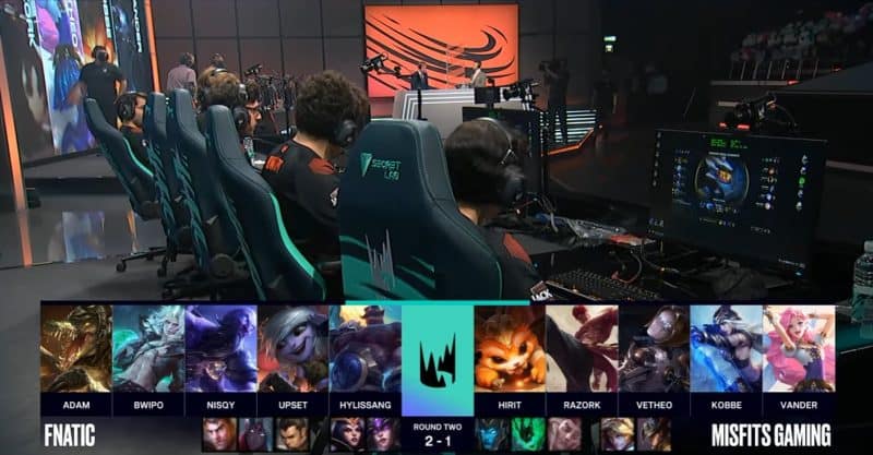 A screenshot from the LEC broadcast for the Summer Playoffs match between Fnatic and Misfits. The Game Four drafts appear on screen with a shot of the Fnatic and Misfits LoL teams on the LEC stage above.