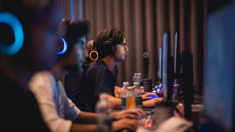 OG's squad sit down at their PCs for a game of Dota 2